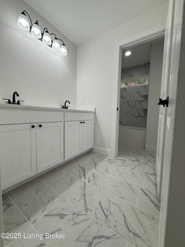 6702 Shirley Ave, Prospect, KY 40059 - bathroom with marble finish floors, double vanity, baseboards, and shower / bath combination