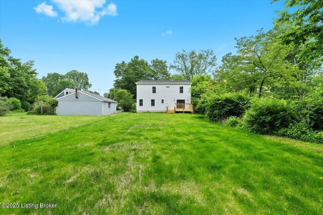 6702 Shirley Ave, Louisville, KY 40059 - view of green lawn with a deck