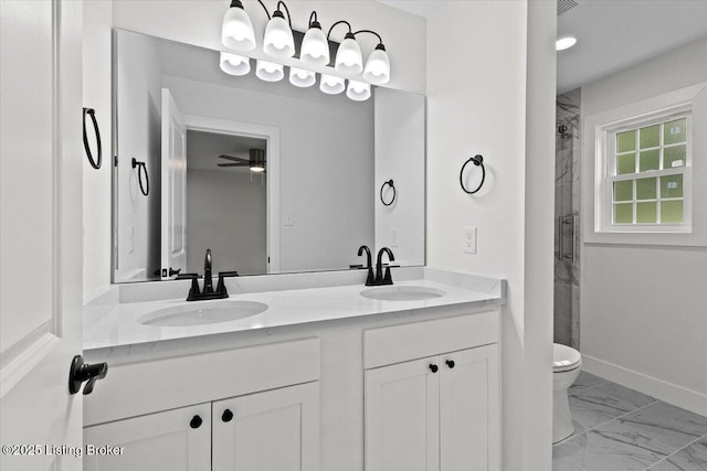 6702 Shirley Ave, Louisville, KY 40059 - full bathroom featuring marble finish flooring, double vanity, toilet, tiled shower, and a ceiling fan