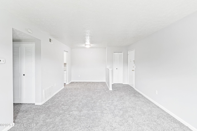 3401 Lesway Ct, Louisville, KY 40220 - empty room featuring carpet, baseboards, and a textured ceiling