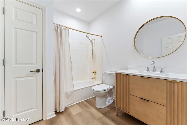 3447 Hurstbourne Ridge Blvd, Louisville, KY 40299 - full bathroom with wood finished floors, vanity, shower / bath combo with shower curtain, and toilet
