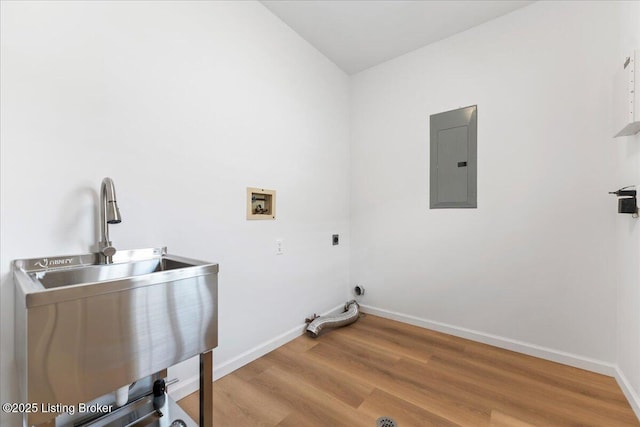 3447 Hurstbourne Ridge Blvd, Louisville, KY 40299 - laundry area featuring electric panel, light wood finished floors, electric dryer hookup, washer hookup, and baseboards