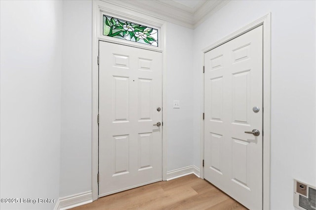 3447 Hurstbourne Ridge Blvd, Louisville, KY 40299 - foyer entrance featuring light wood-style flooring, crown molding, and baseboards