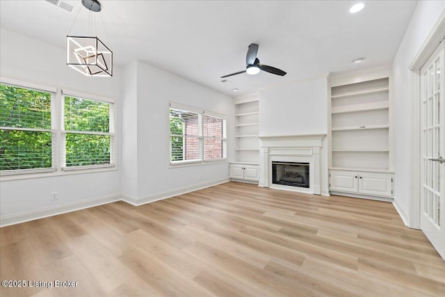 3447 Hurstbourne Ridge Blvd, Louisville, KY 40299 - unfurnished living room with baseboards, ceiling fan, light wood-style floors, a glass covered fireplace, and recessed lighting