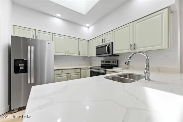 3447 Hurstbourne Ridge Blvd, Louisville, KY 40299 - kitchen featuring stainless steel appliances, a sink, light stone countertops, and recessed lighting