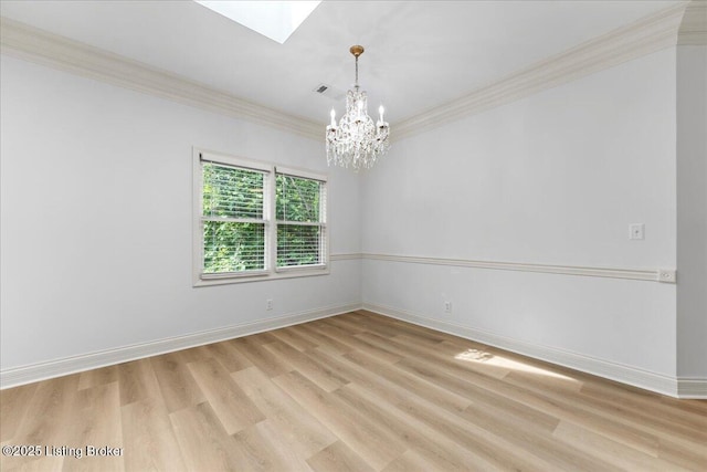 3447 Hurstbourne Ridge Blvd, Louisville, KY 40299 - unfurnished room featuring a chandelier, light wood finished floors, a skylight, ornamental molding, and baseboards