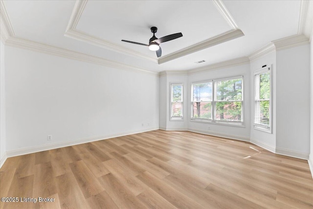 3447 Hurstbourne Ridge Blvd, Louisville, KY 40299 - spare room with a tray ceiling, light wood-style floors, crown molding, a ceiling fan, and baseboards