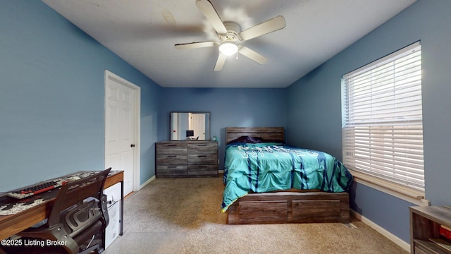 512 Valley College Dr, Louisville, KY 40272 - carpeted bedroom with baseboards and ceiling fan
