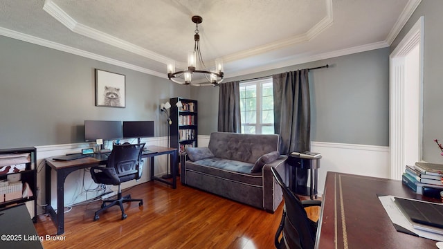 512 Valley College Dr, Louisville, KY 40272 - home office with a raised ceiling, wood finished floors, a chandelier, crown molding, and wainscoting
