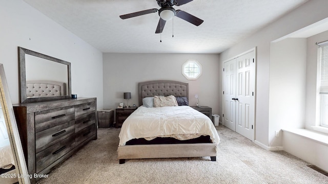 512 Valley College Dr, Louisville, KY 40272 - bedroom with light carpet, a ceiling fan, and a closet