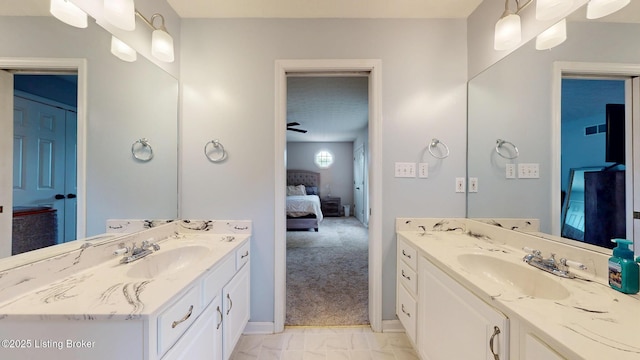 512 Valley College Dr, Louisville, KY 40272 - bathroom with ensuite bath, two vanities, baseboards, and marble finish floors
