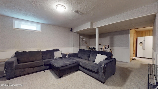 512 Valley College Dr, Louisville, KY 40272 - living area featuring wainscoting, carpet, and a textured ceiling