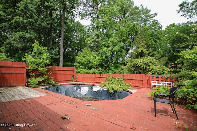 512 Valley College Dr, Louisville, KY 40272 - deck featuring a fenced backyard and view of scattered trees