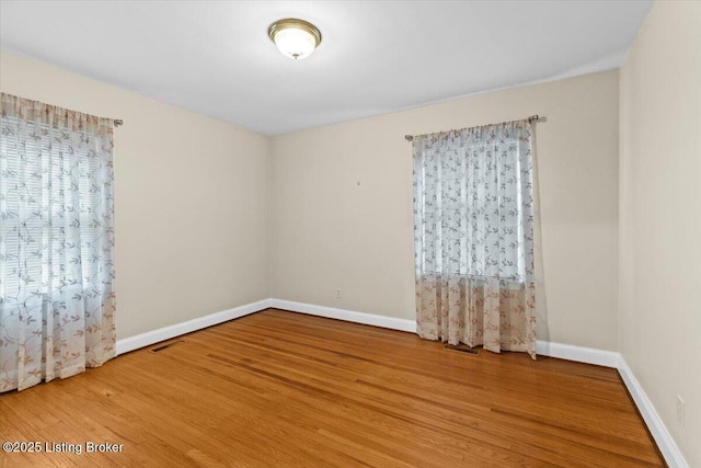 3306 Grandview Ave, Louisville, KY 40207 - empty room featuring wood finished floors and baseboards