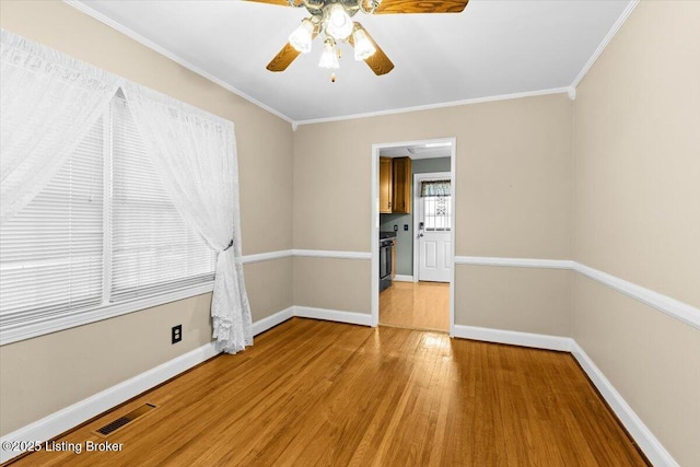 3306 Grandview Ave, Louisville, KY 40207 - unfurnished room with wood finished floors, ceiling fan, and crown molding