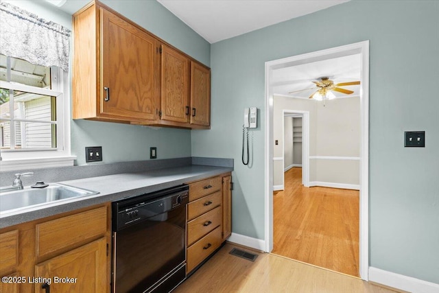 3306 Grandview Ave, Louisville, KY 40207 - kitchen with dishwasher, light wood-type flooring, brown cabinets, and a ceiling fan