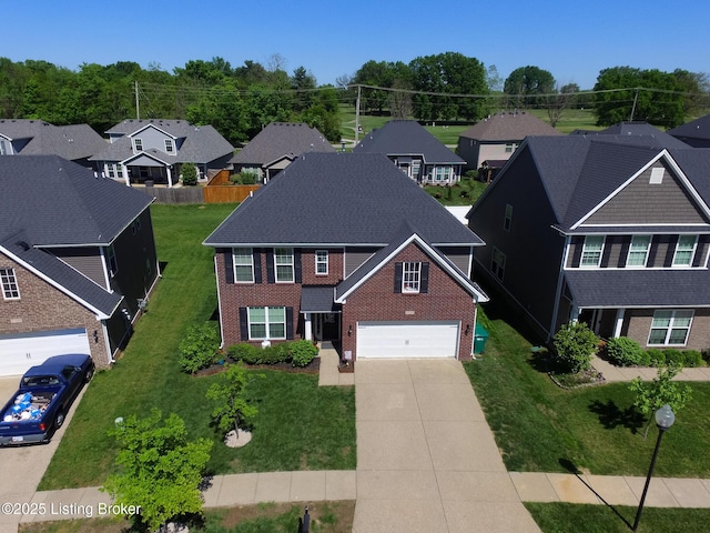 17121 Piton Way, Louisville, KY 40245 - view of front of house with brick siding, driveway, a residential view, and a front yard