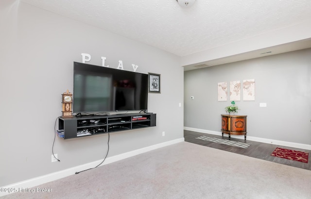 17121 Piton Way, Louisville, KY 40245 - carpeted living room featuring baseboards and a textured ceiling