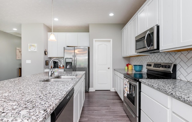 17121 Piton Way, Louisville, KY 40245 - kitchen with stainless steel appliances, a sink, dark wood finished floors, backsplash, and white cabinets