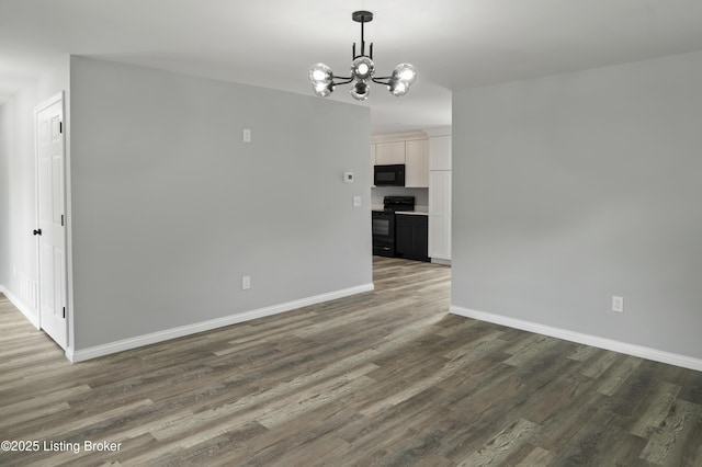 802 Kentucky Ave, Frankfort, KY 40601 - unfurnished dining area with a chandelier, dark wood finished floors, and baseboards