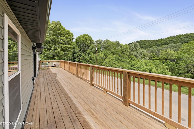 802 Kentucky Ave, Frankfort, KY 40601 - wooden deck featuring a view of trees