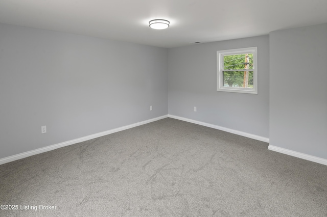 802 Kentucky Ave, Frankfort, KY 40601 - spare room featuring dark carpet and baseboards