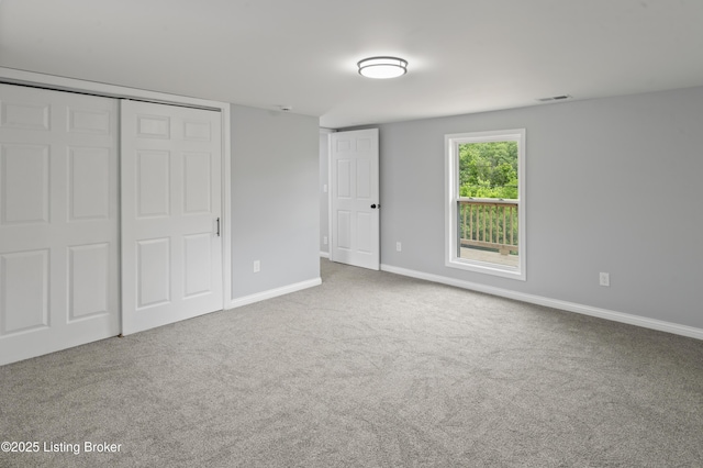 802 Kentucky Ave, Frankfort, KY 40601 - unfurnished bedroom with carpet floors, baseboards, and a closet