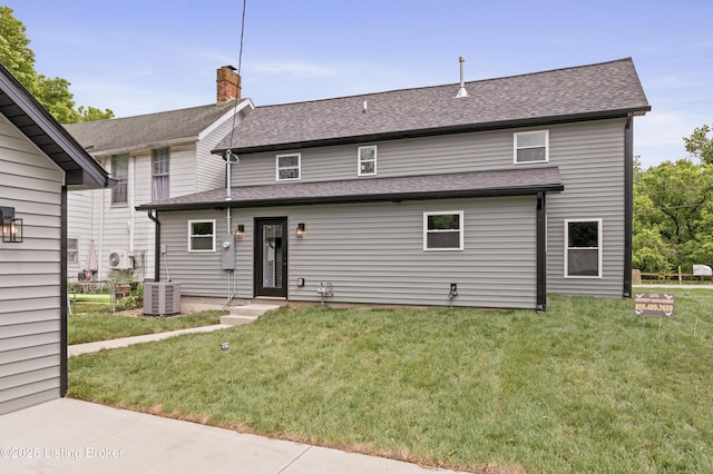 802 Kentucky Ave, Frankfort, KY 40601 - rear view of property with a lawn, cooling unit, a chimney, and roof with shingles