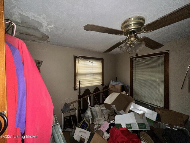 500 N 39th St, Louisville, KY 40212 - bedroom with a textured ceiling and ceiling fan