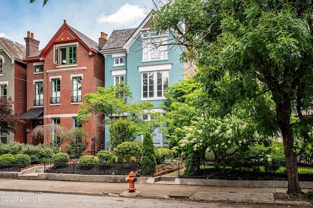 1337 S 1st St Unit 3R, Louisville, KY 40208 - victorian house with brick siding and a high end roof