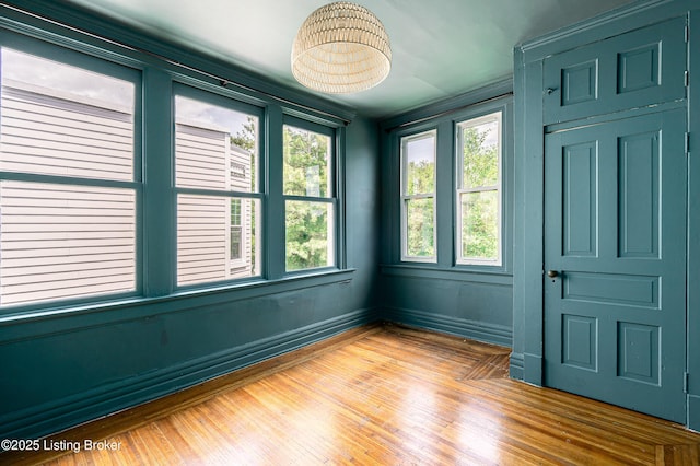 1337 S 1st St Unit 3R, Louisville, KY 40208 - empty room with light wood-style floors and baseboards