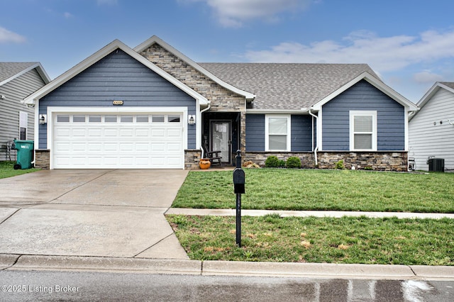 10938 Pheasant Hill Cir, Louisville, KY 40229 - view of front facade featuring stone siding, cooling unit, concrete driveway, and a garage