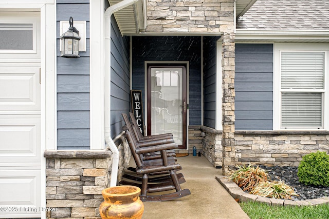 10938 Pheasant Hill Cir, Louisville, KY 40229 - doorway to property featuring stone siding and a shingled roof