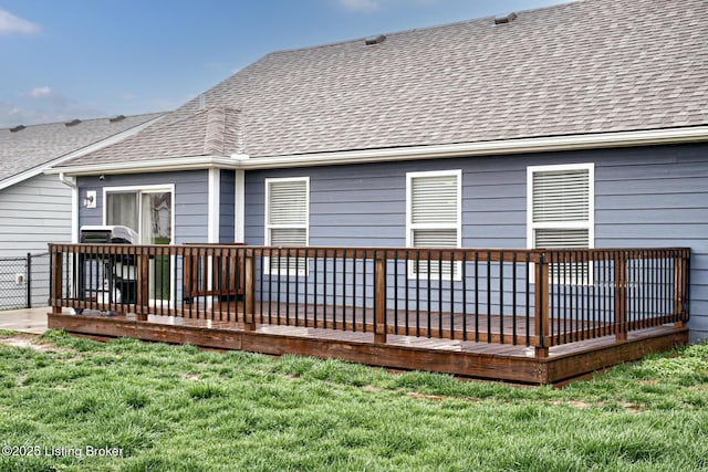 10938 Pheasant Hill Cir, Louisville, KY 40229 - rear view of house featuring a shingled roof, a wooden deck, and a lawn