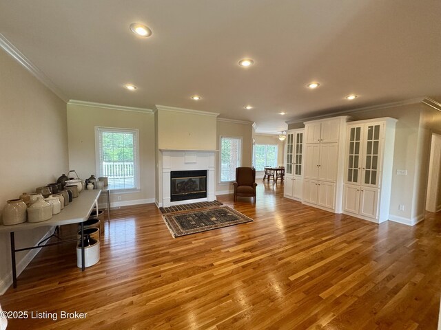 144 Woodhill Rd, Bardstown, KY 40004 - living area featuring crown molding, baseboards, light wood finished floors, healthy amount of natural light, and recessed lighting