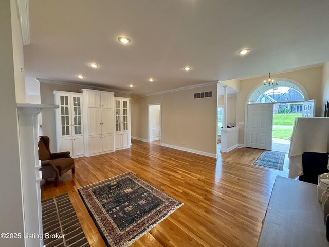 144 Woodhill Rd, Bardstown, KY 40004 - living room with crown molding, a chandelier, light wood-style flooring, baseboards, and recessed lighting