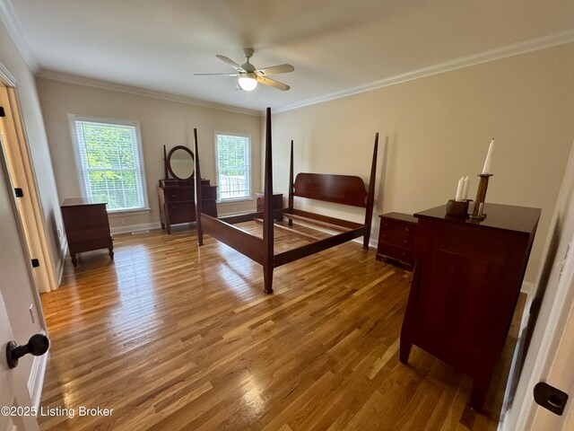 144 Woodhill Rd, Bardstown, KY 40004 - bedroom featuring wood finished floors, crown molding, and baseboards