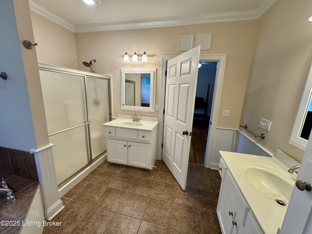 144 Woodhill Rd, Bardstown, KY 40004 - bathroom with a stall shower, crown molding, two vanities, tile patterned floors, and a garden tub