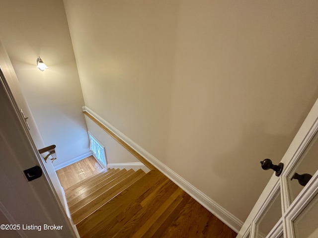 144 Woodhill Rd, Bardstown, KY 40004 - stairs featuring wood finished floors and baseboards