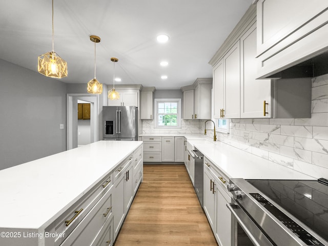 101 Harry Rucker Rd, Bardstown, KY 40004 - kitchen featuring stainless steel appliances, under cabinet range hood, a sink, recessed lighting, and tasteful backsplash