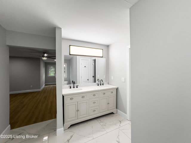 101 Harry Rucker Rd, Bardstown, KY 40004 - full bathroom with double vanity, a ceiling fan, baseboards, and marble look tile flooring