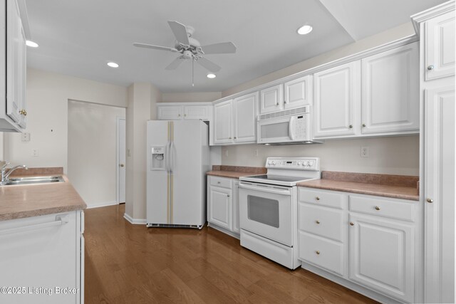 10106 Blossom Tree Way, Louisville, KY 40241 - kitchen with white appliances, a sink, dark wood-style floors, a ceiling fan, and white cabinets