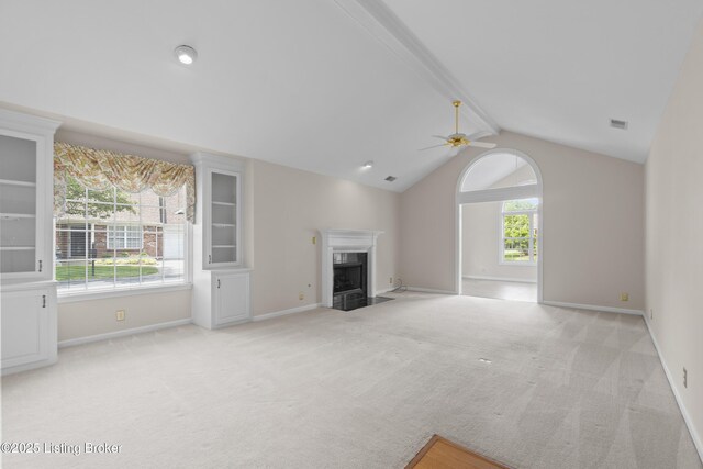 10106 Blossom Tree Way, Louisville, KY 40241 - unfurnished living room featuring plenty of natural light, light colored carpet, a fireplace, and a ceiling fan