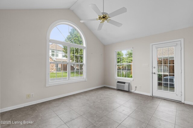 10106 Blossom Tree Way, Louisville, KY 40241 - spare room featuring lofted ceiling, a wall mounted AC, tile patterned floors, baseboards, and a ceiling fan