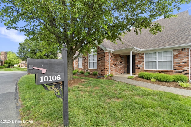 10106 Blossom Tree Way, Louisville, KY 40241 - view of front of property with a shingled roof, brick siding, and a front yard