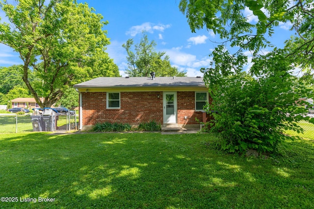 5612 Oakridge Pl, Louisville, KY 40229 - rear view of house with brick siding and a gate