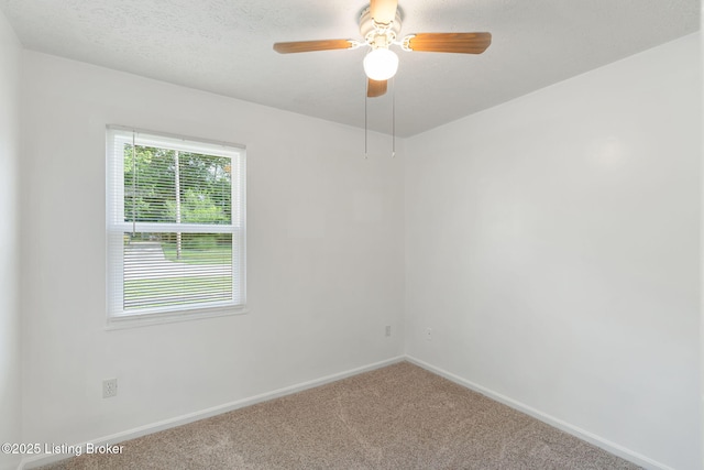 5612 Oakridge Pl, Louisville, KY 40229 - carpeted spare room with baseboards and a ceiling fan