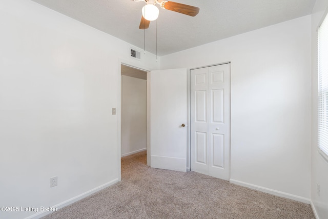 5612 Oakridge Pl, Louisville, KY 40229 - unfurnished bedroom featuring carpet flooring, a closet, baseboards, and a ceiling fan