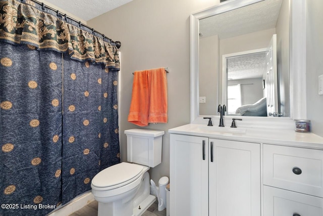 238 Crossfield Dr, Mt Washington, KY 40047 - bathroom with a textured ceiling, toilet, and vanity