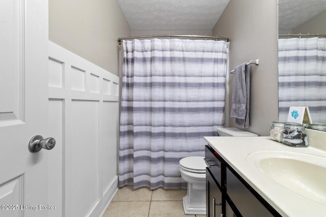 238 Crossfield Dr, Mt Washington, KY 40047 - full bathroom featuring a textured ceiling, vanity, toilet, tile patterned flooring, and a shower with shower curtain